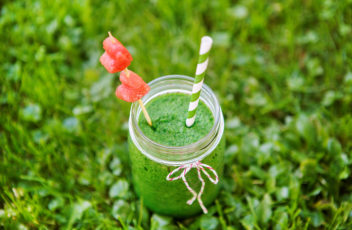 Spinach green smoothie as healthy summer drink.